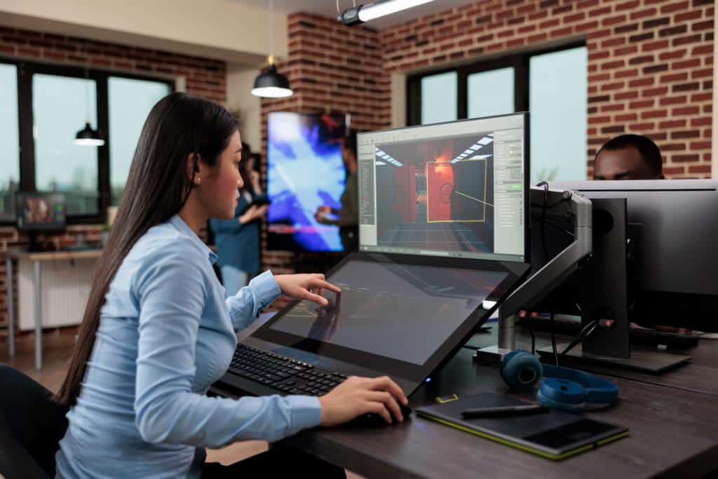 Woman designing a video game